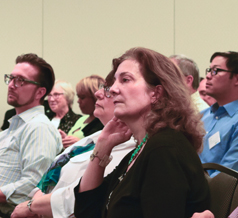 Employees at CFPB Meeting