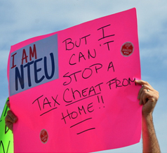 NTEU Member Holding Sign